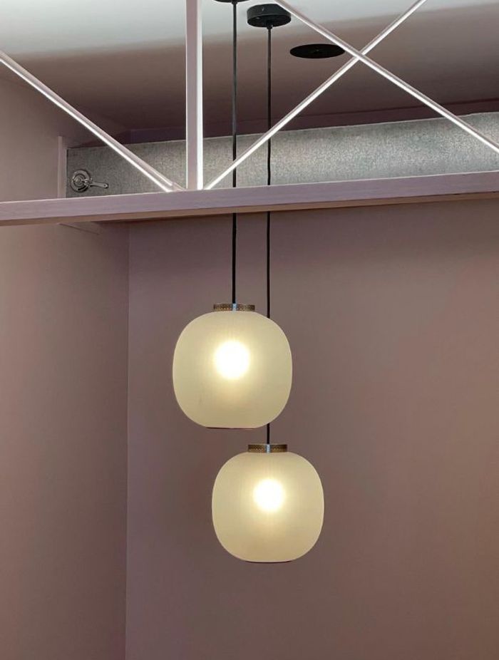 'Common Space Studio' sees a culmination of raw and structural design elements, so opting for beautiful pendants that offer soft lighting was the perfect choice to compliment the space's aesthetic.
