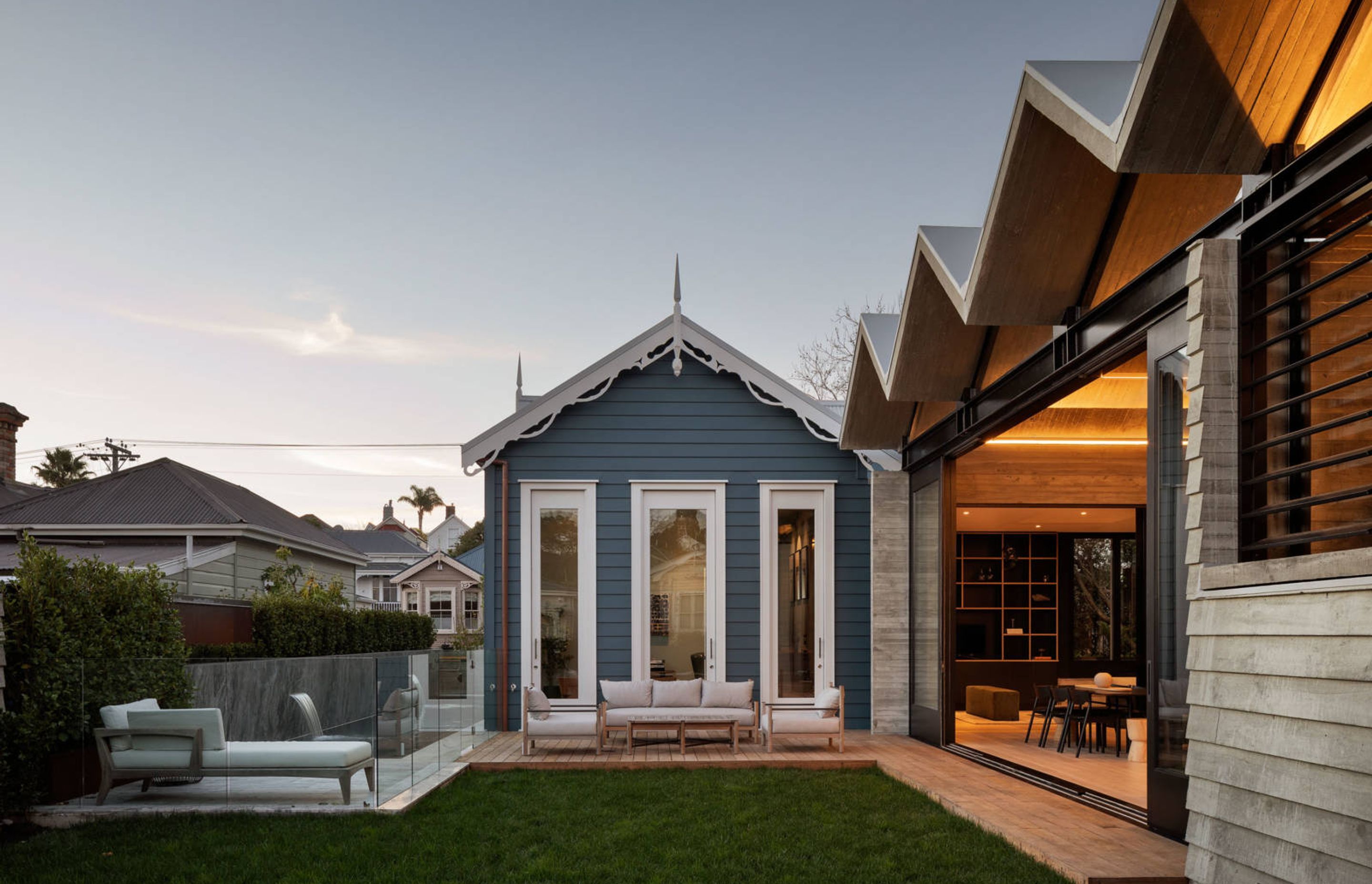 Poured Pleats by Jack McKinney Architects is a heritage villa with a traditional gable that has been mimicked in its striking new addition that reflects the gabled rooflines of its Ponsonby neighbourhood. Photography by David Straight.