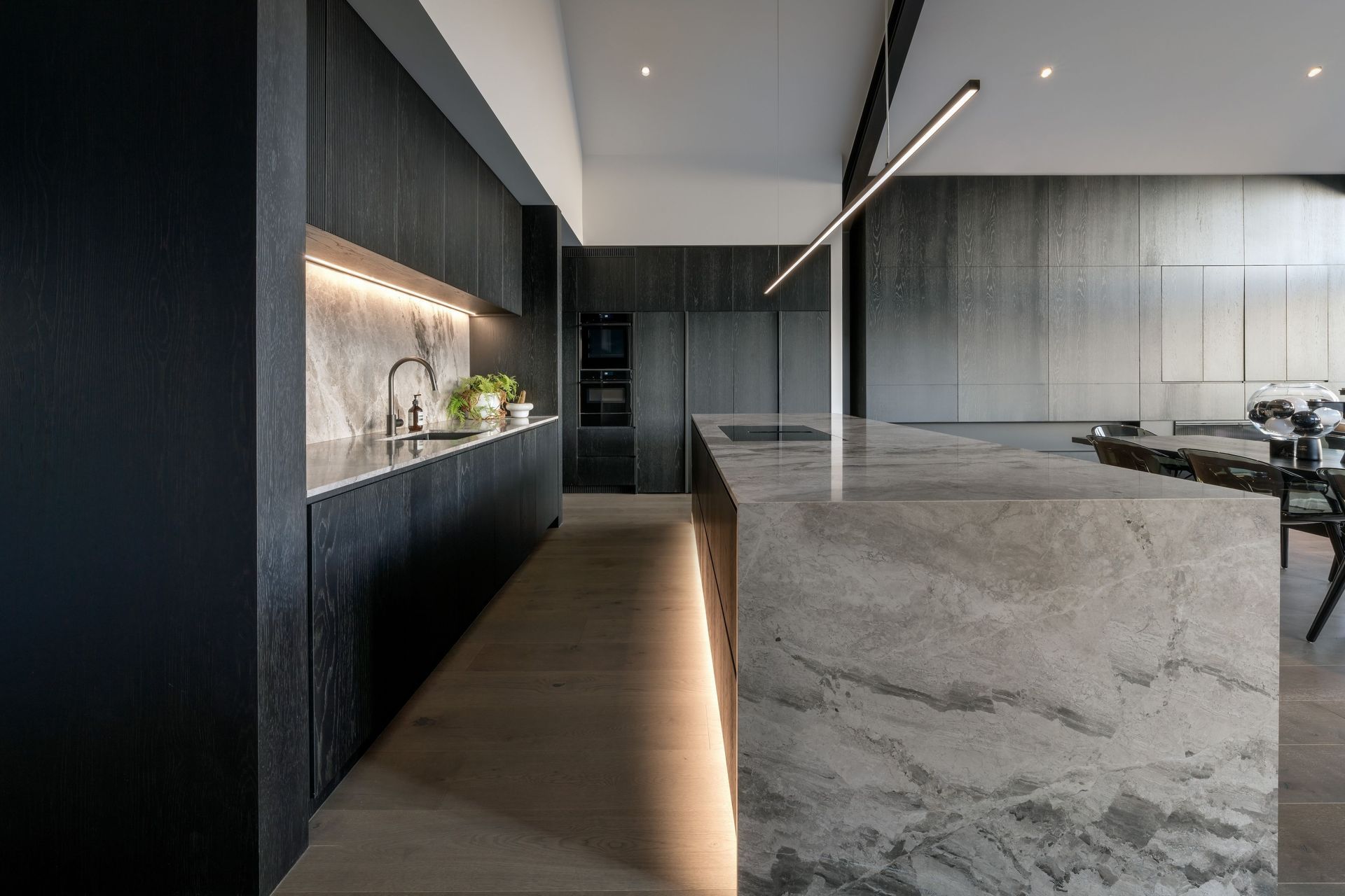 A refined chef's kitchen is the hub of this home