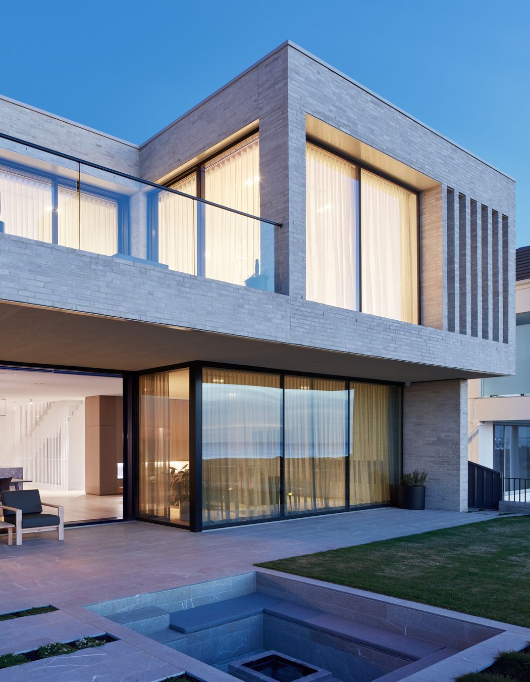 The beachfront with a small plunge pool | Tennyson Residence by Enzo Caroscio Architects