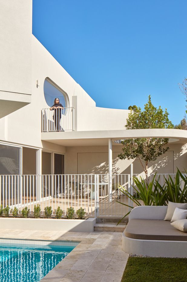 The home unfolds across split levels, each designed for effortless entertaining.