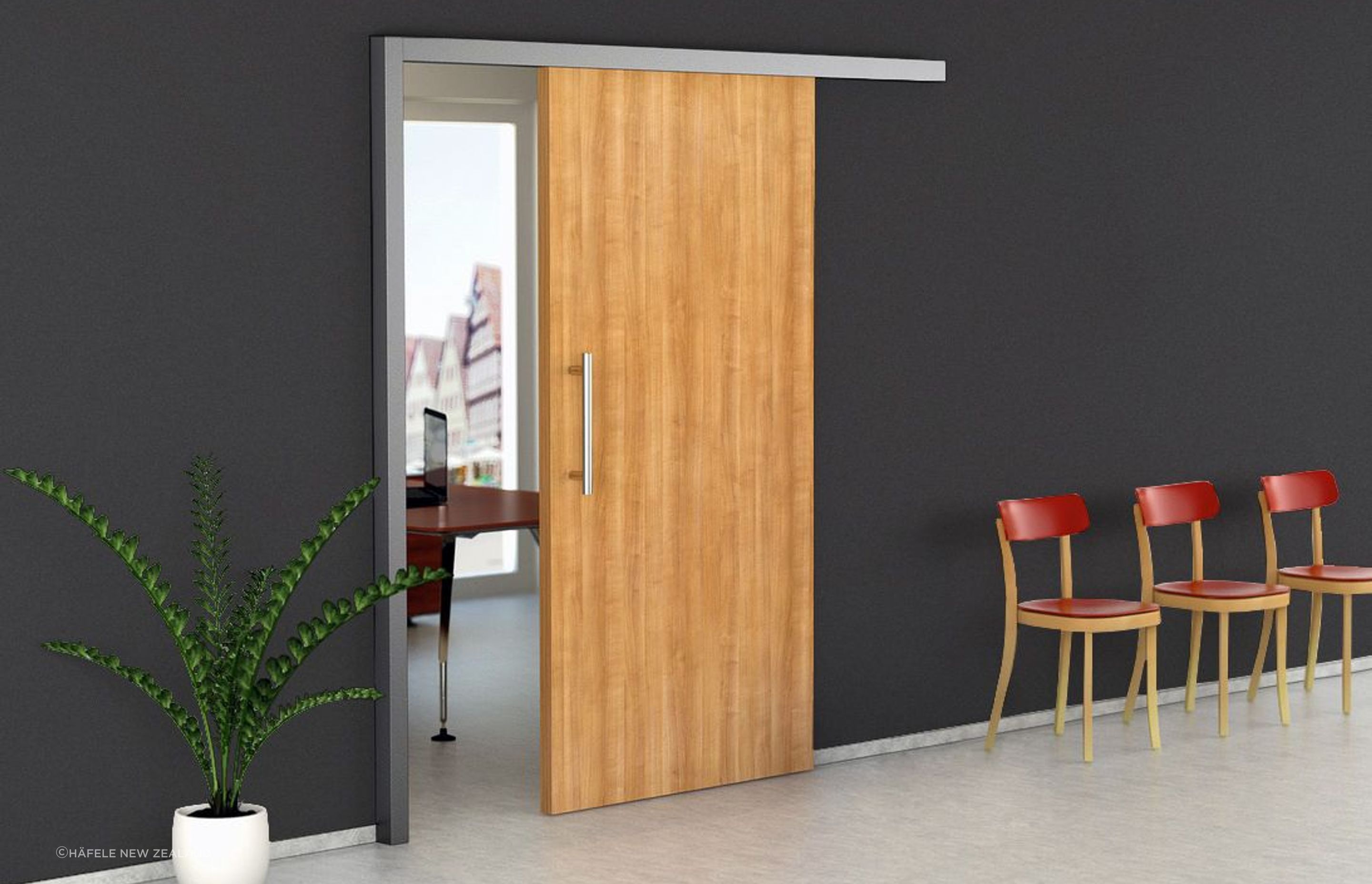 The benefits of offset doors can be enhanced by using soundproof models, like this soundproof sliding door from Hafele.