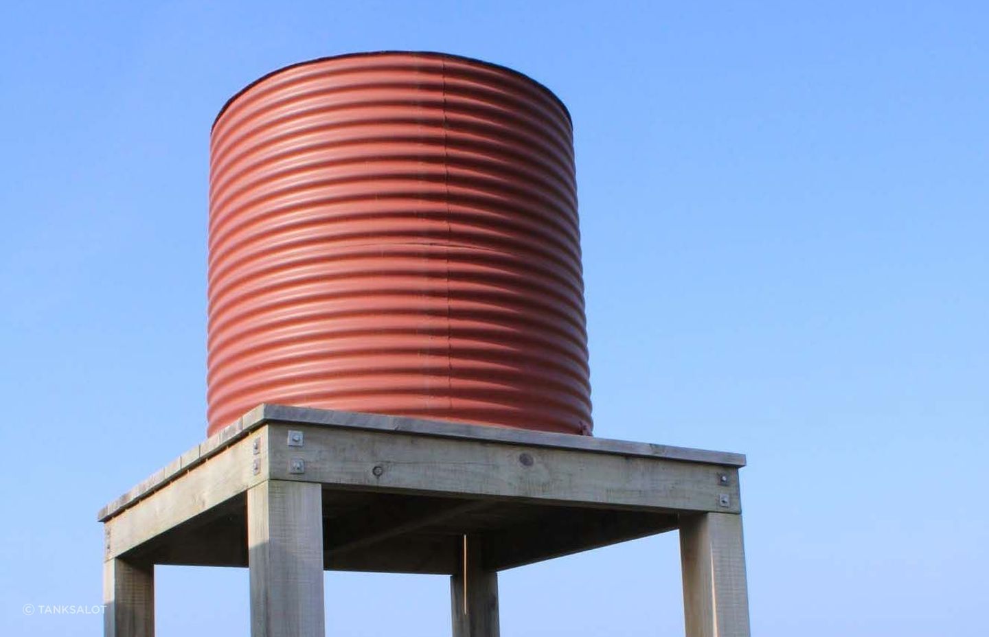 Water tanks, like this stainless steel model from Tanksalot, can provide all the water storage needed off-grid.