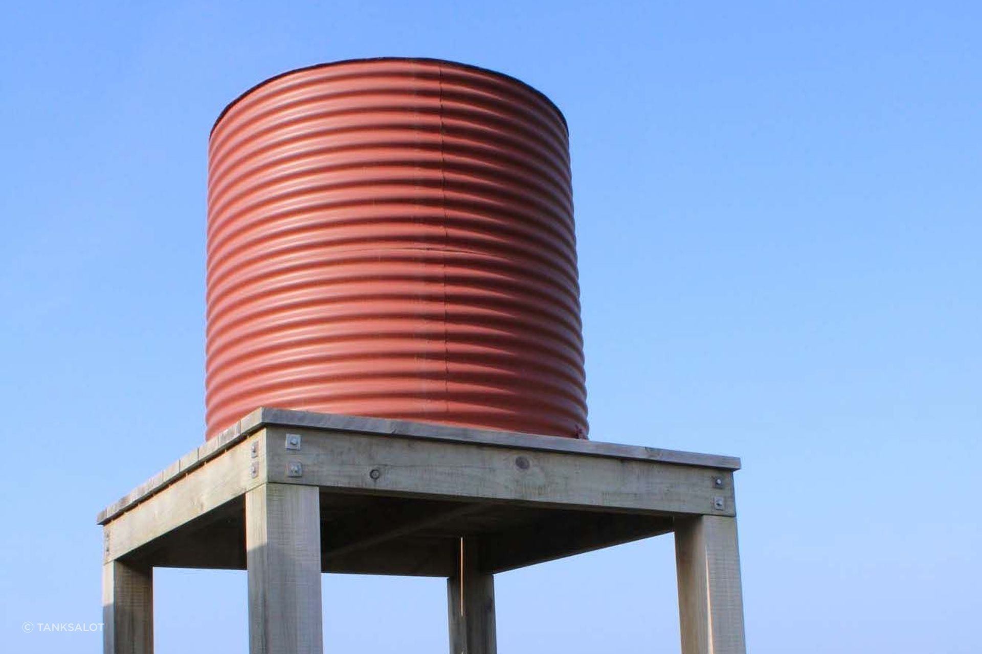 Water tanks, like this stainless steel model from Tanksalot, can provide all the water storage needed off-grid.