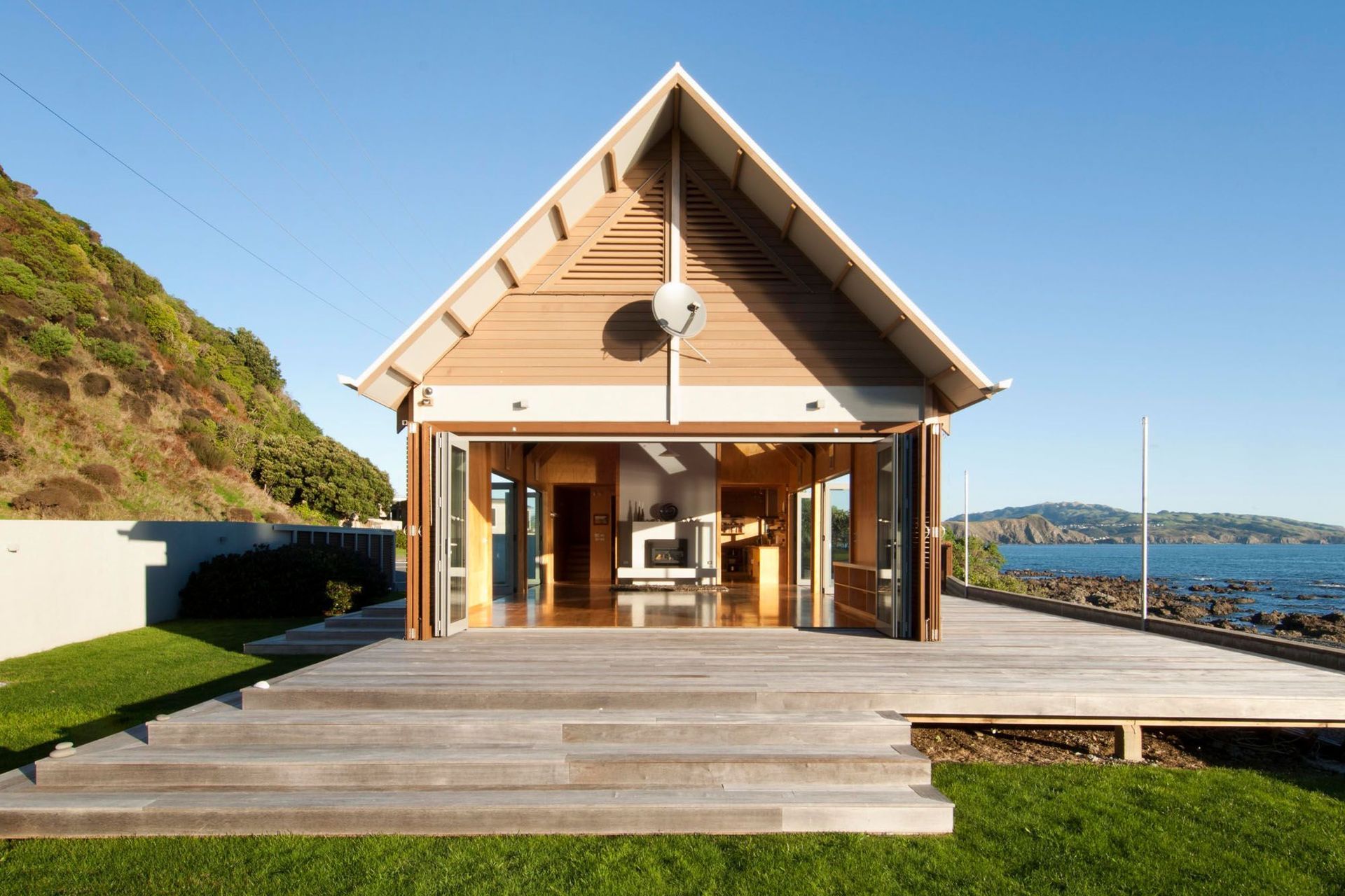 The Boathouse by Novak + Middleton can open up on three sides, taking advantage of the picturesque surroundings