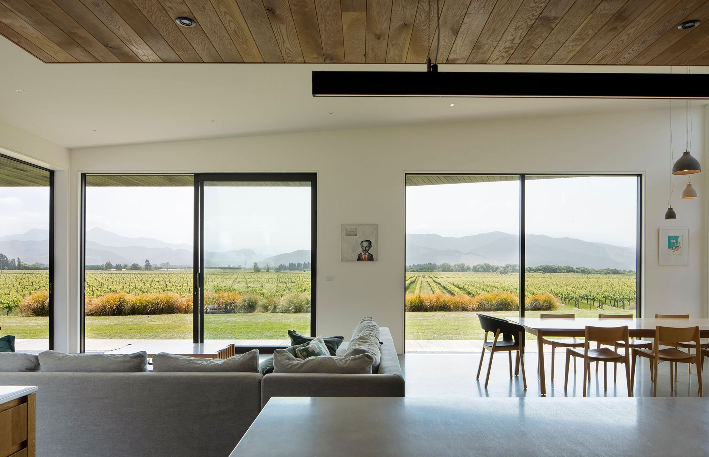 The living area of Vineyard House faces the grape vines and the afternoon sun.