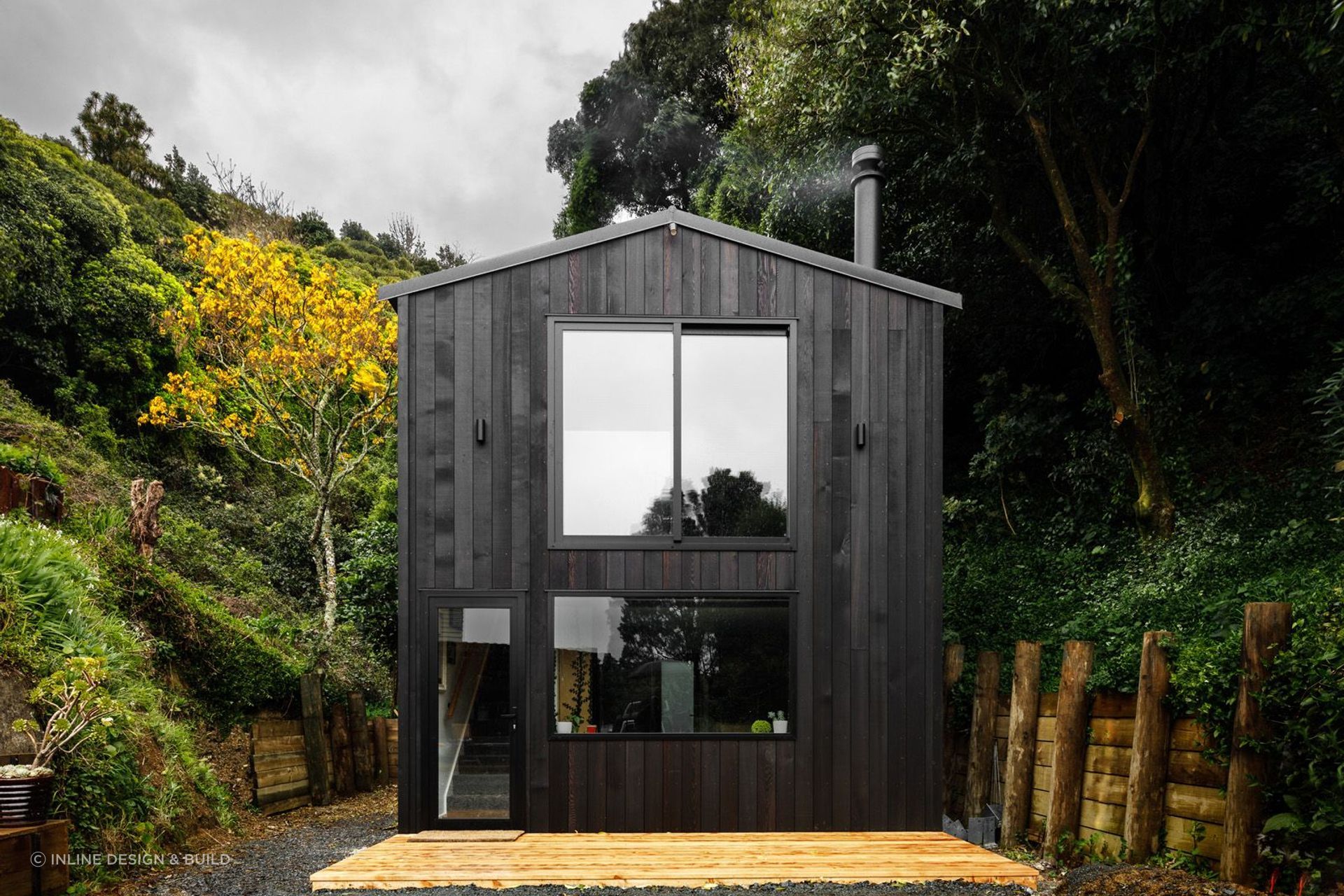 The bold and stylish dark timber exterior of the Vogeltown Tiny Home by Inline Design &amp; Build