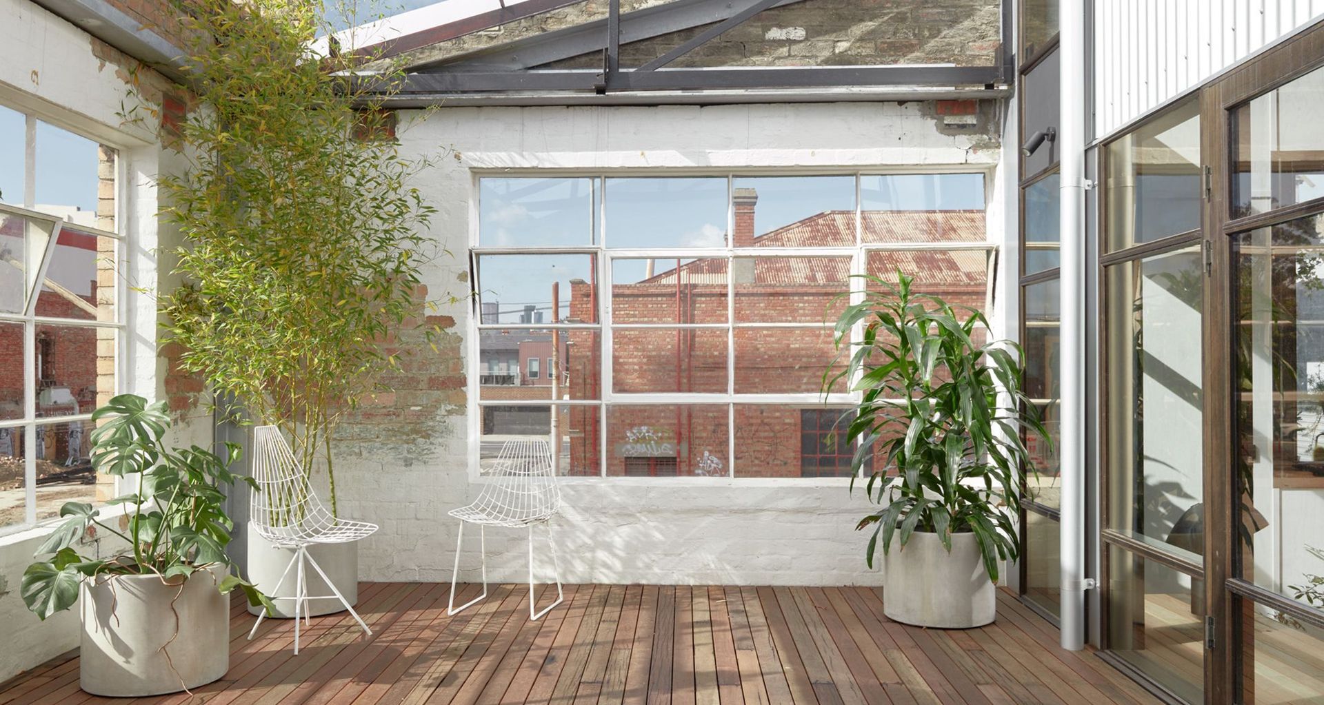 Warehouse Greenhouse portrays the thoughtful storytelling of a home's industrial past and conscious future.