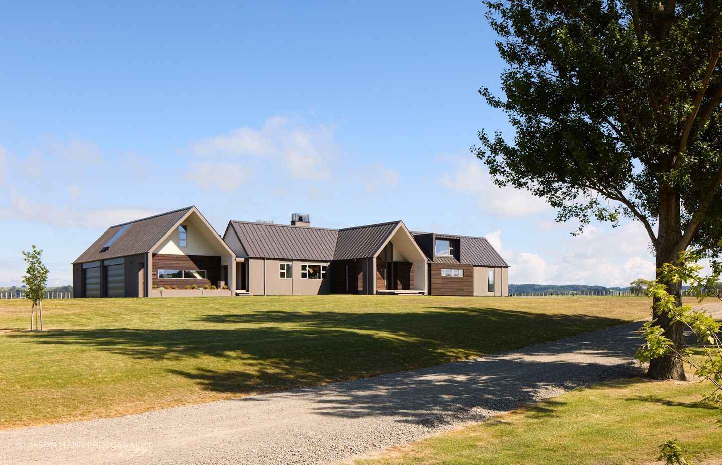 The recessed overhangs at the ends of the gables mean the windows do not simply appear as apertures in the form of the building.