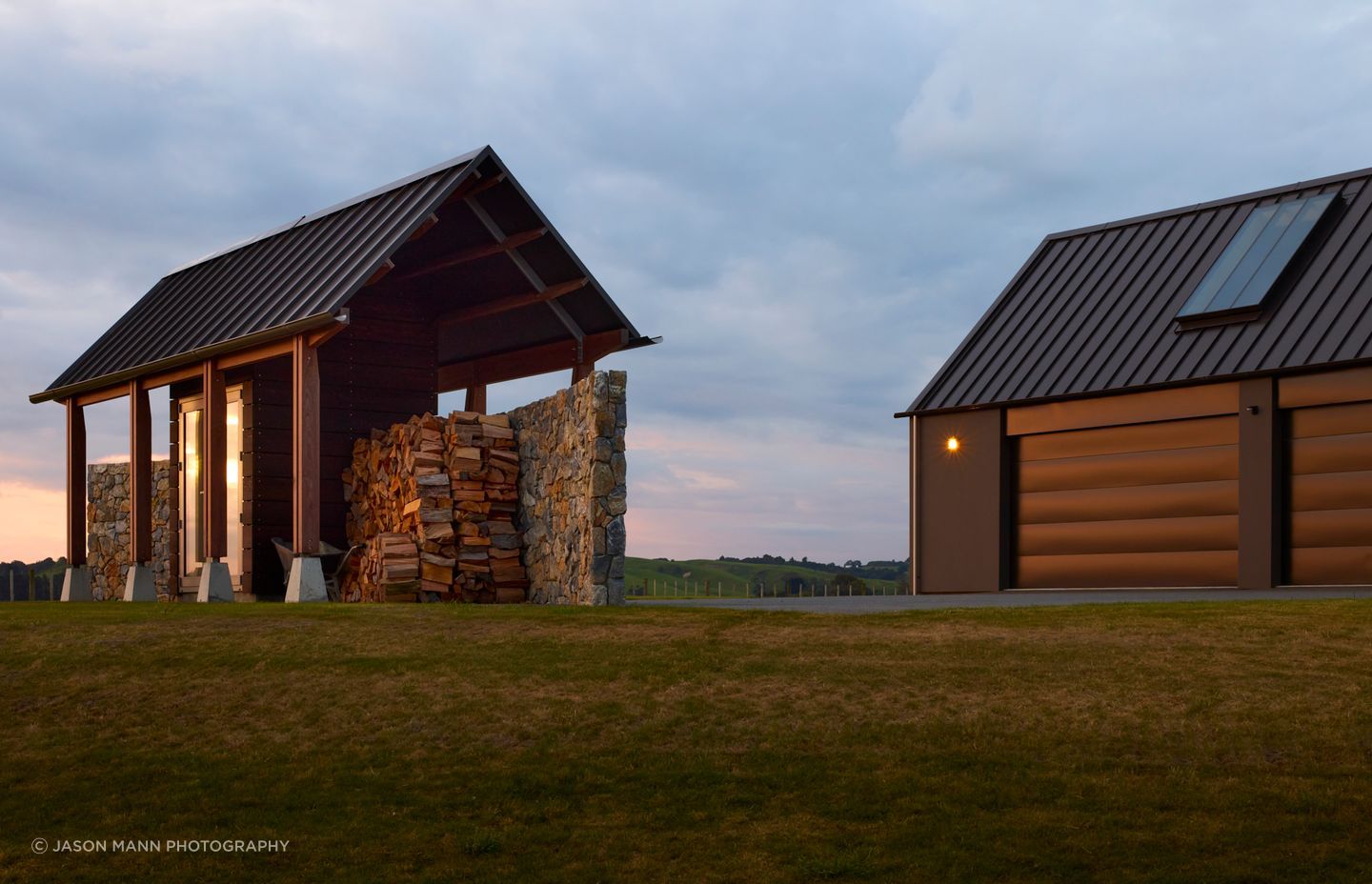 The woodshed doubles as a visual break, so that the utility sheds on the farm can't be seen from the living spaces.