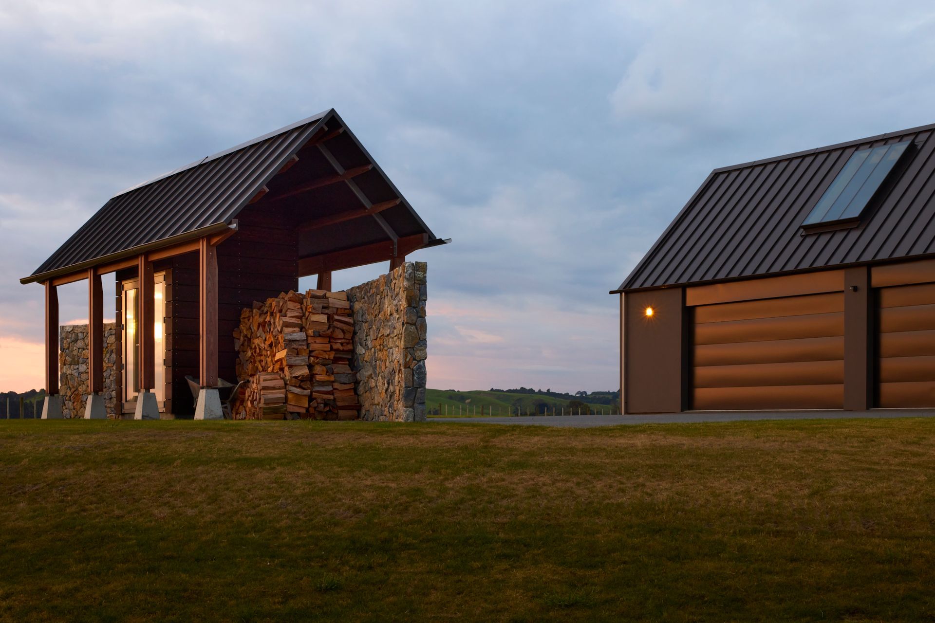 The woodshed doubles as a visual break, so that the utility sheds on the farm can't be seen from the living spaces.