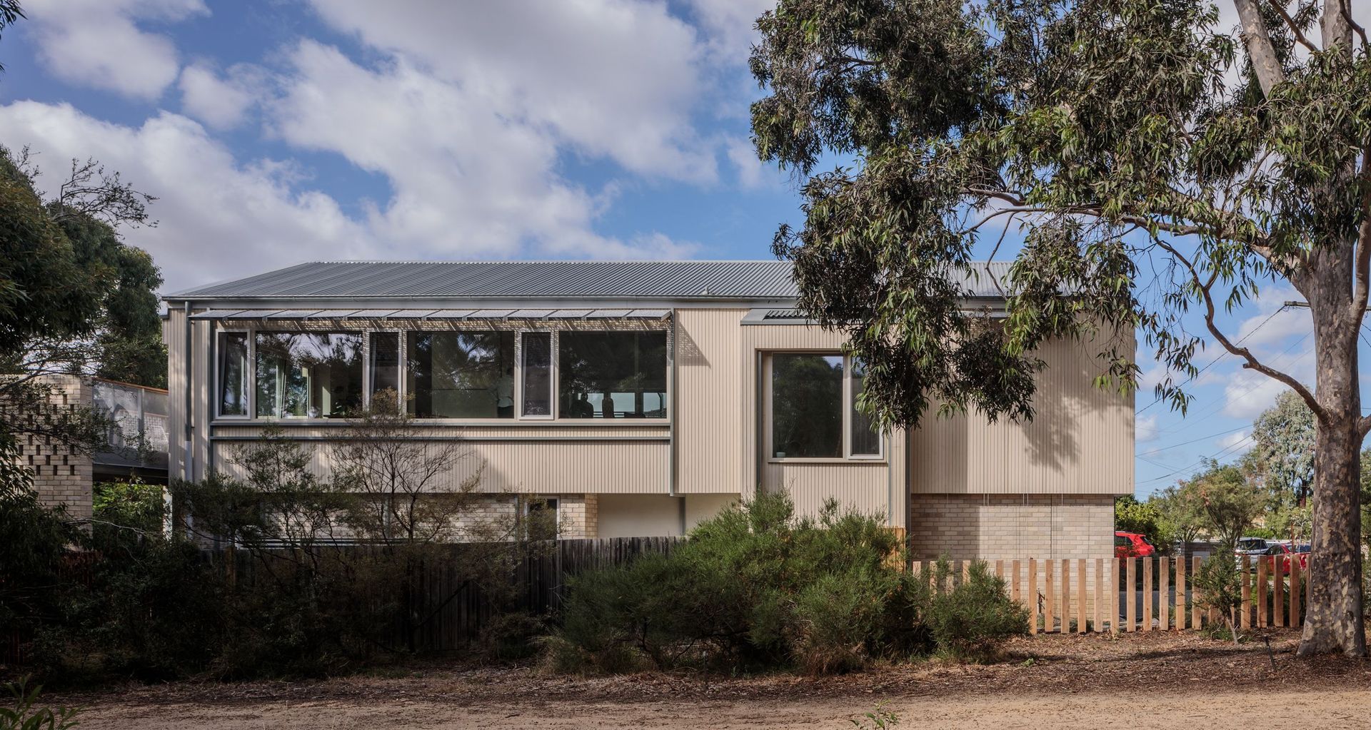 The energy-efficient dwelling was designed to blend in with its natural surroundings, sitting directly opposite green, leafy All Nations Park.