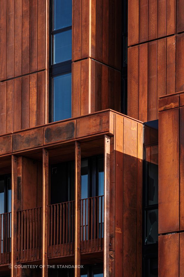 Much like the punched windows that mirror the surrounding buildings, StandardX is more than just a temporary brick-and-mortar home.