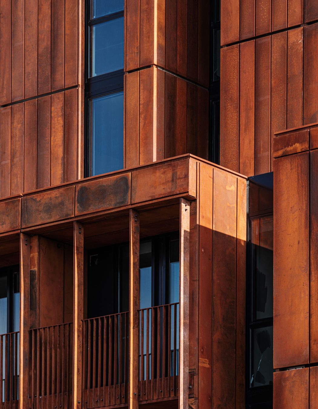 Much like the punched windows that mirror the surrounding buildings, StandardX is more than just a temporary brick-and-mortar home.