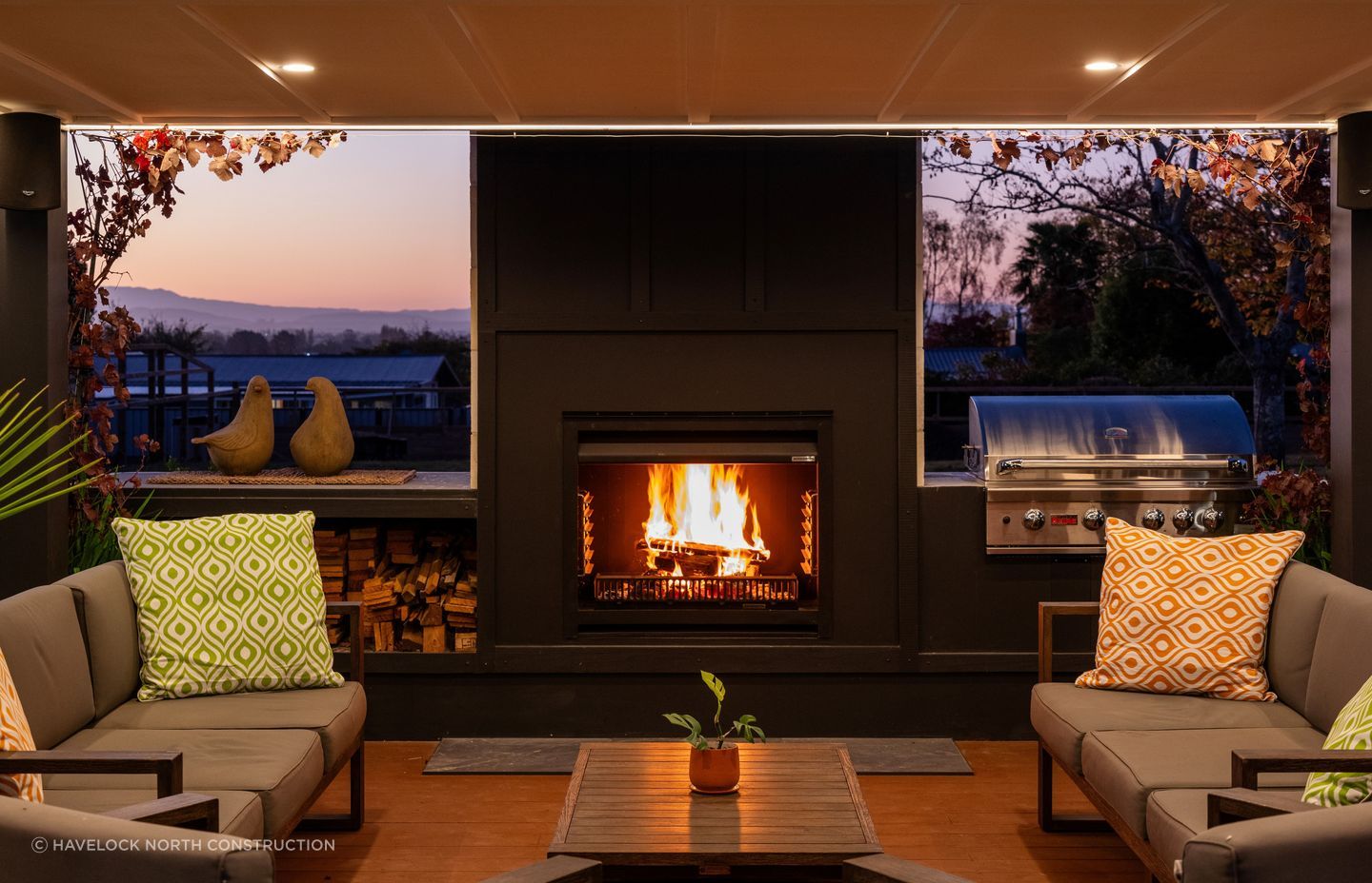 The roaring flame of the open fireplace is the perfect place to host family and friends, taking in the surrounding terrain of Havelock North.