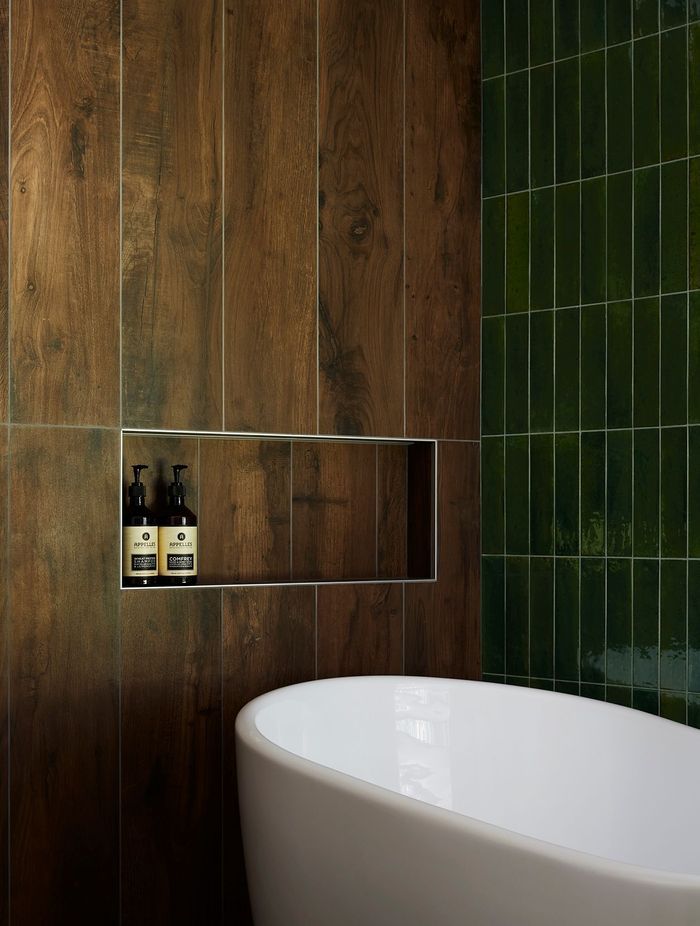 Finished with Cherryion wood-look tiles to add warmth.