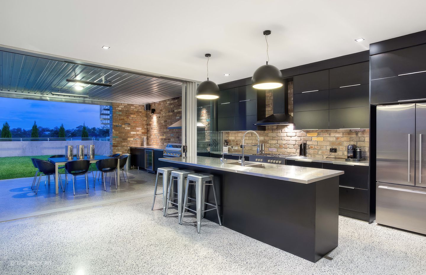 From the outside in: the recycled bricks used to create the structure of the home also feature on the internal walls.