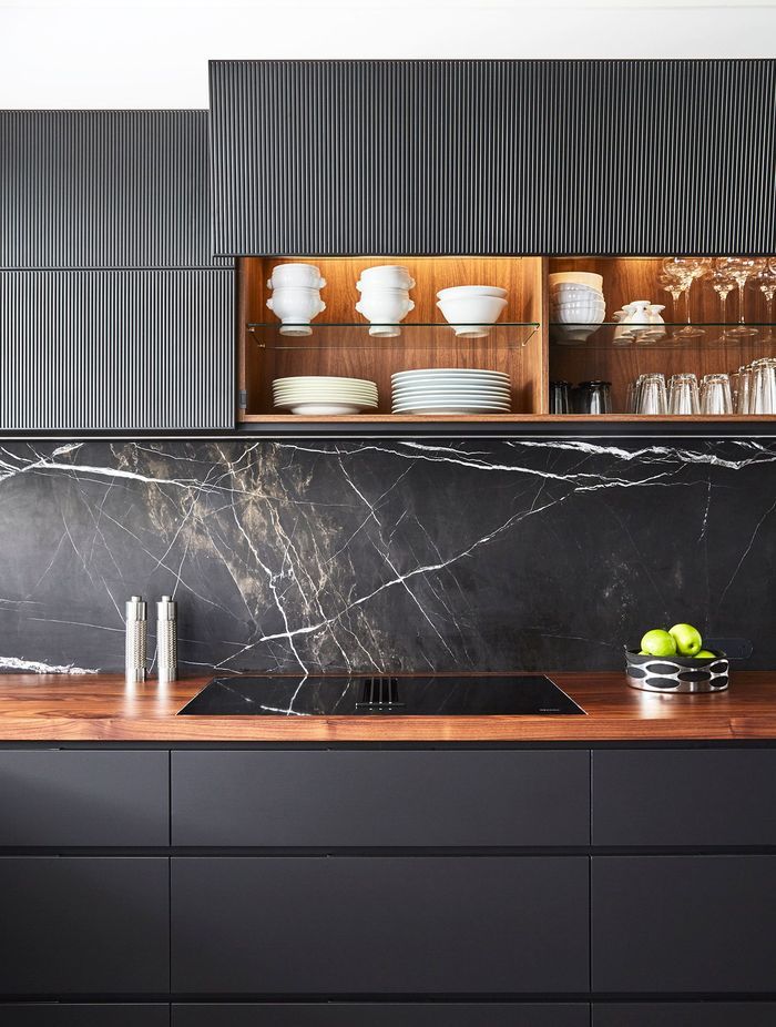 Bruno Perla honed marble splashback draws the eye.