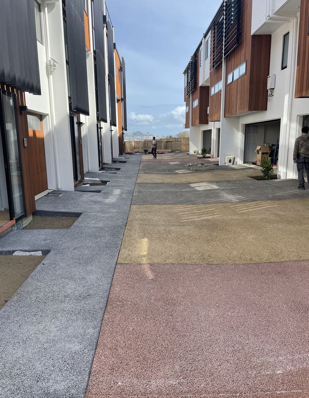 Permeable concrete is made up of stone aggregate, cement, water, and Permcon's special additive. Without a sand filler, the concrete has holes throughout.