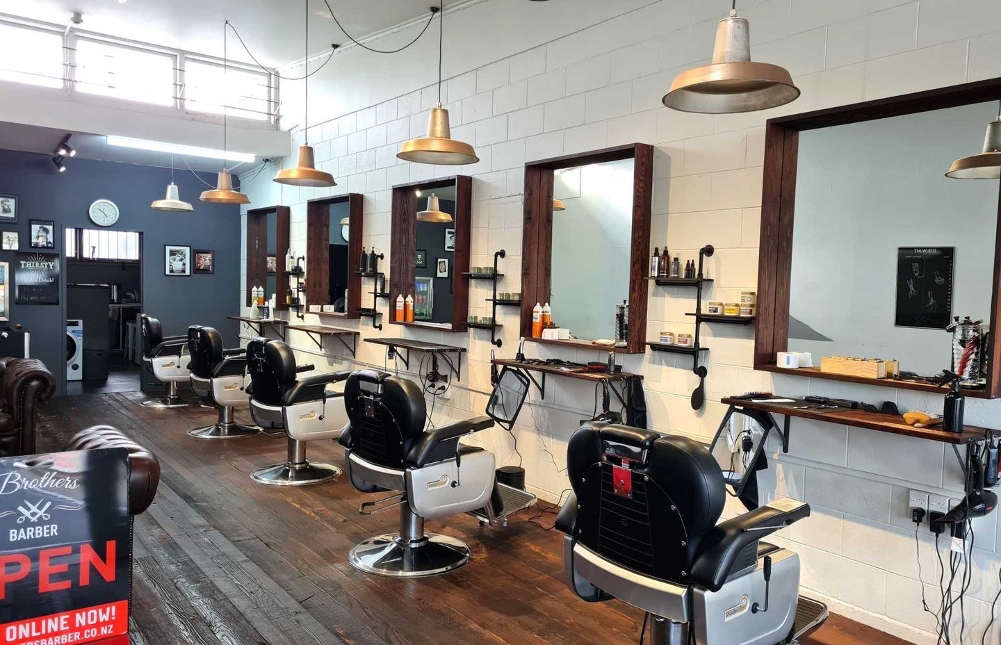 Brothers Barber used wall shelving units for a masculine aesthetic.