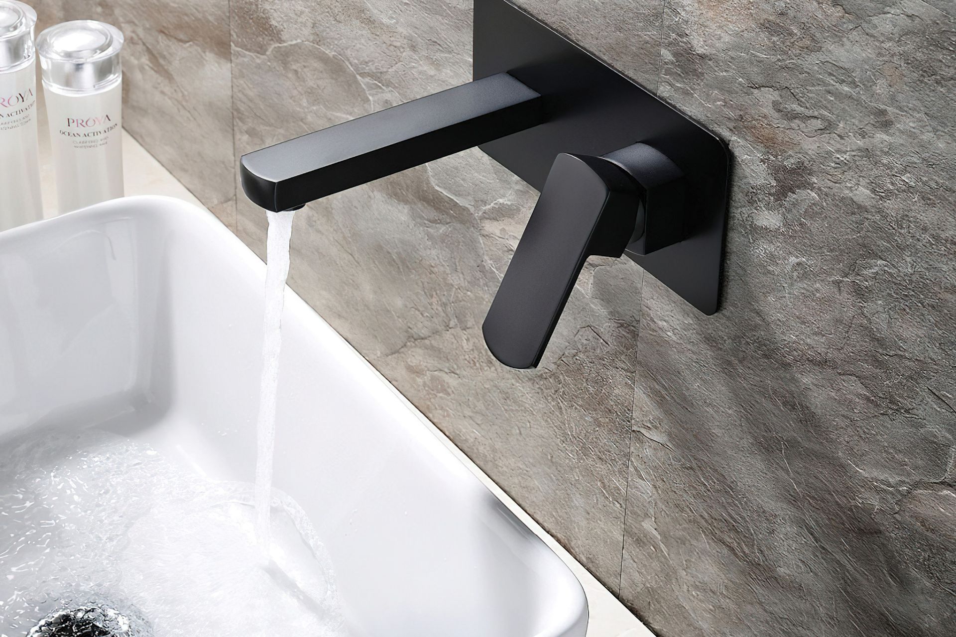 The Koko Wall Mixer with Spout in a stylish matte black finish