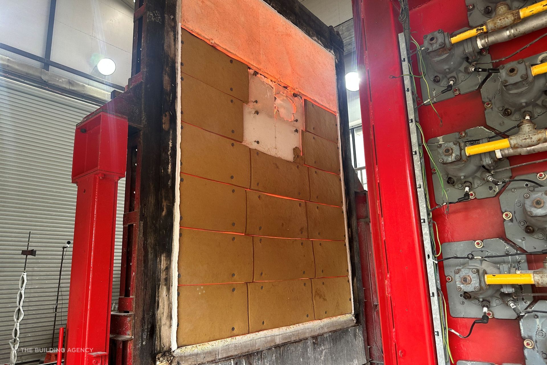 After four hours, the wall assembly still maintained integrity, but the concrete in the furnace was glowing.