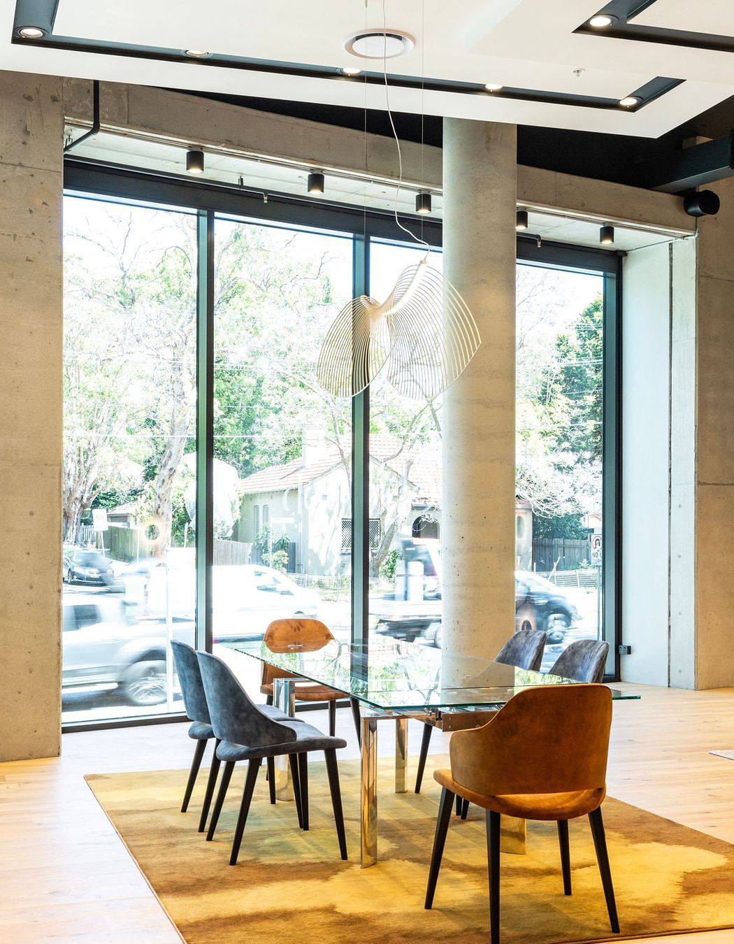 The showroom creates an exclusive backdrop to showcase its iconic pieces.