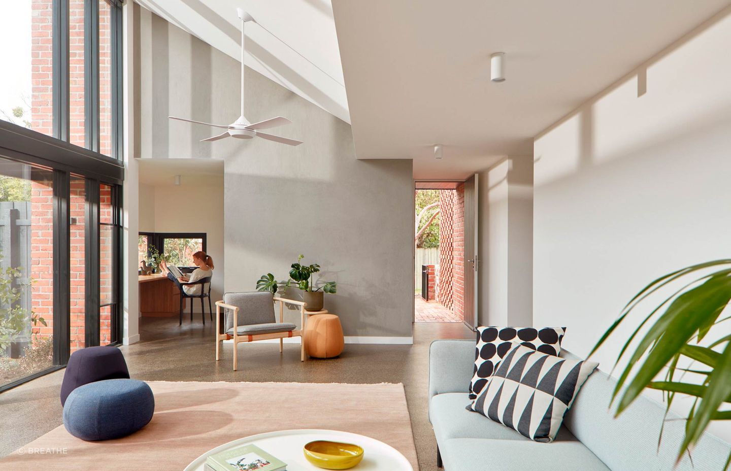 Large glass panels wash the living space with natural light - Photography: Tom Ross