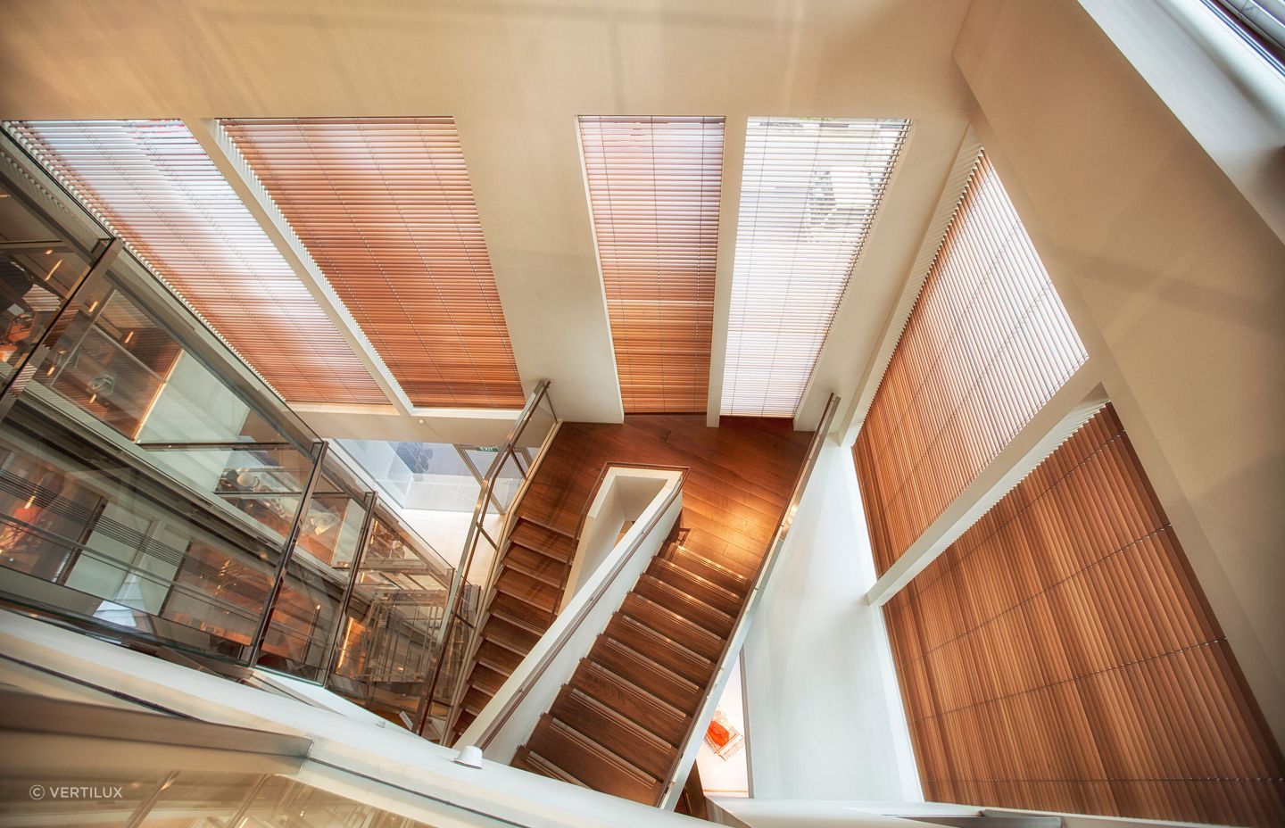 The Hermès store in Singapore featuring 34 motorised cedar Venetian blinds with drops up to 4.5 metres | Vertilux