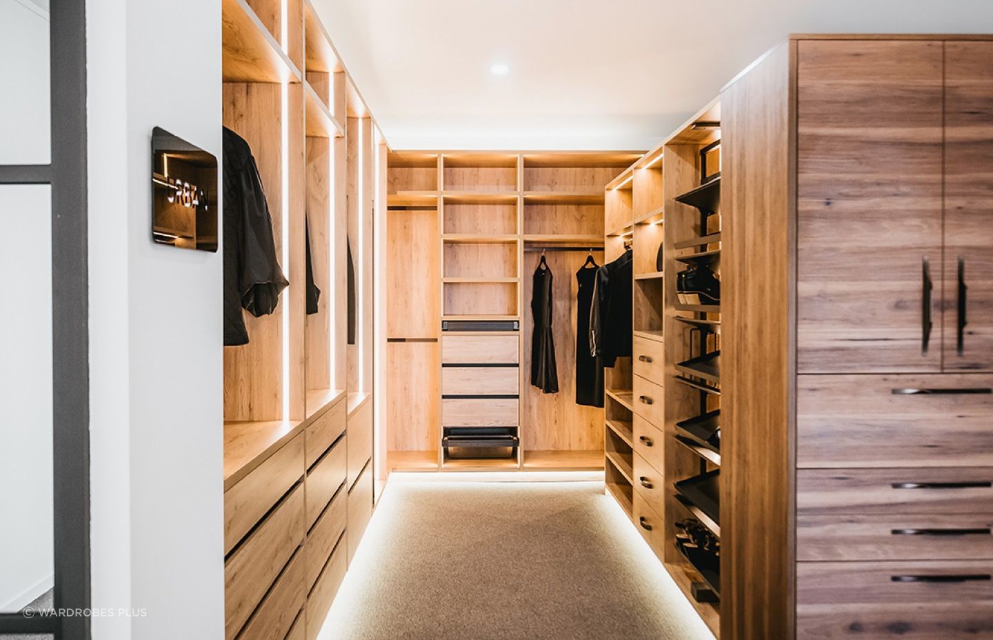 Pull-out shoe drawers with a metal tilt offer a sleek and discreet storage solution when optimising space and keeping shoes out of sight.