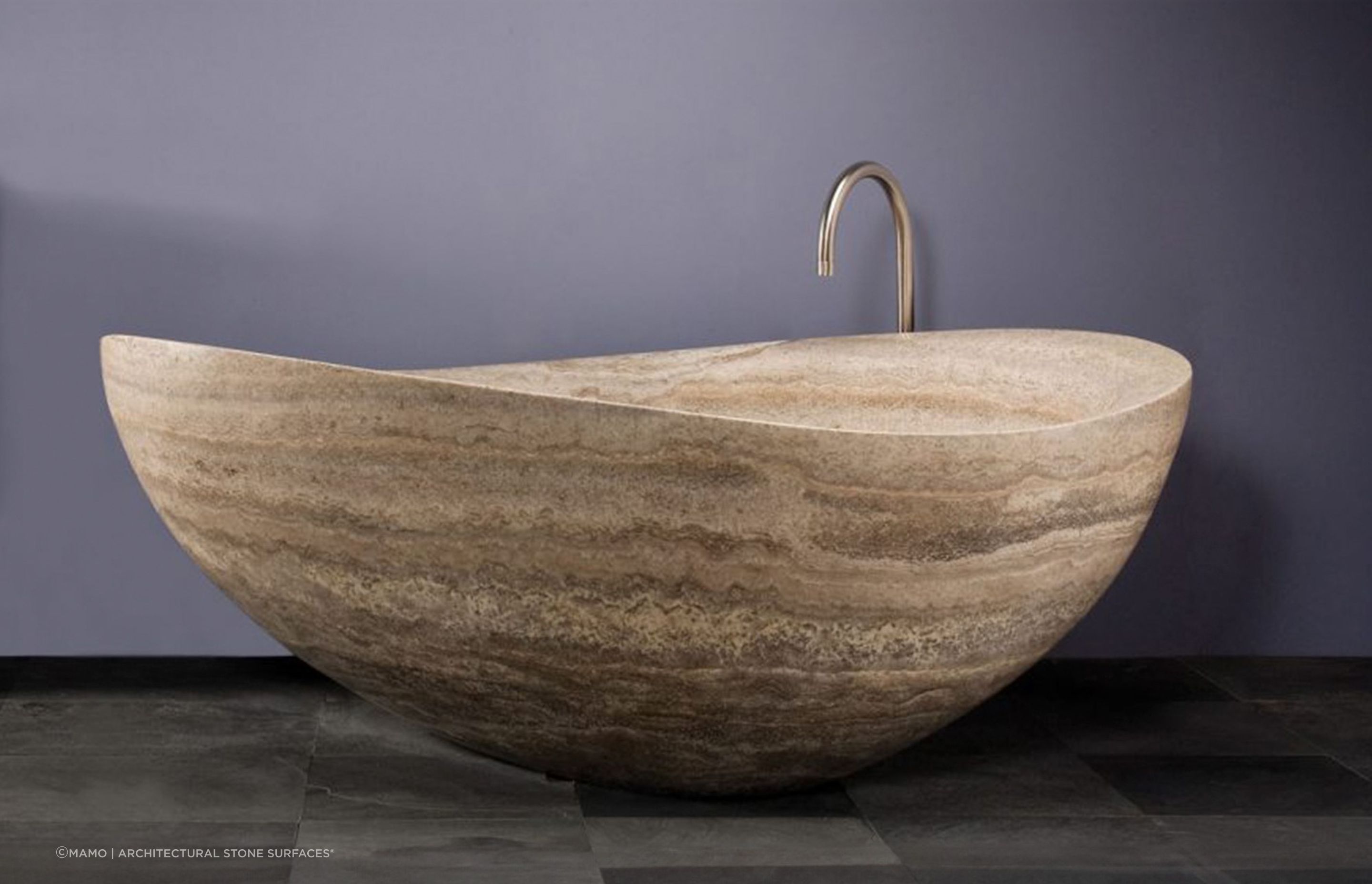 With earthy tones and a honeycomb texture, the Atollo Travertine Bath is the epitome of natural beauty.