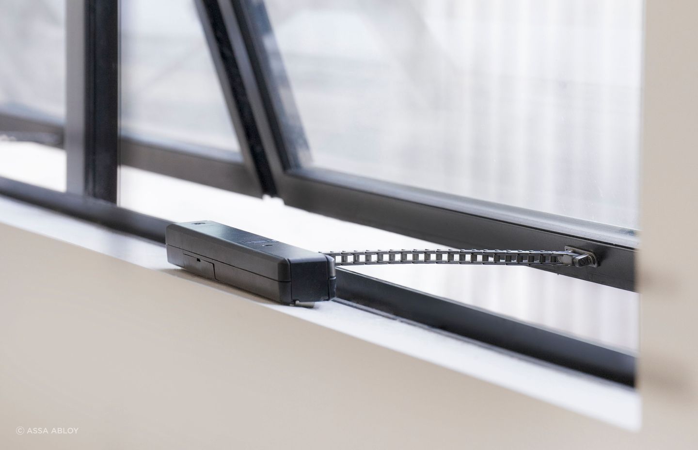 A smart window actuator from ASSA ABLOY.