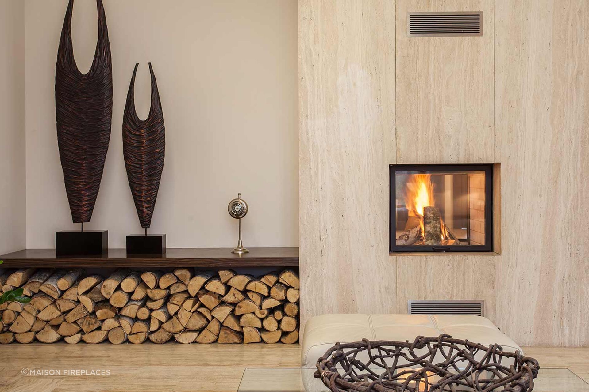 The 'Alberg Tunnel' fireplace insert is a cast iron firebox lined with vermiculite and features a glass door that allows for an aesthetically pleasing fire for your home.