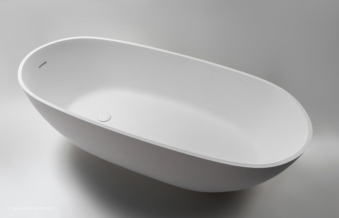 Designed for lying down in complete relaxation, the Almafi Stone Freestanding Bath has strong Mediterranean vibes.