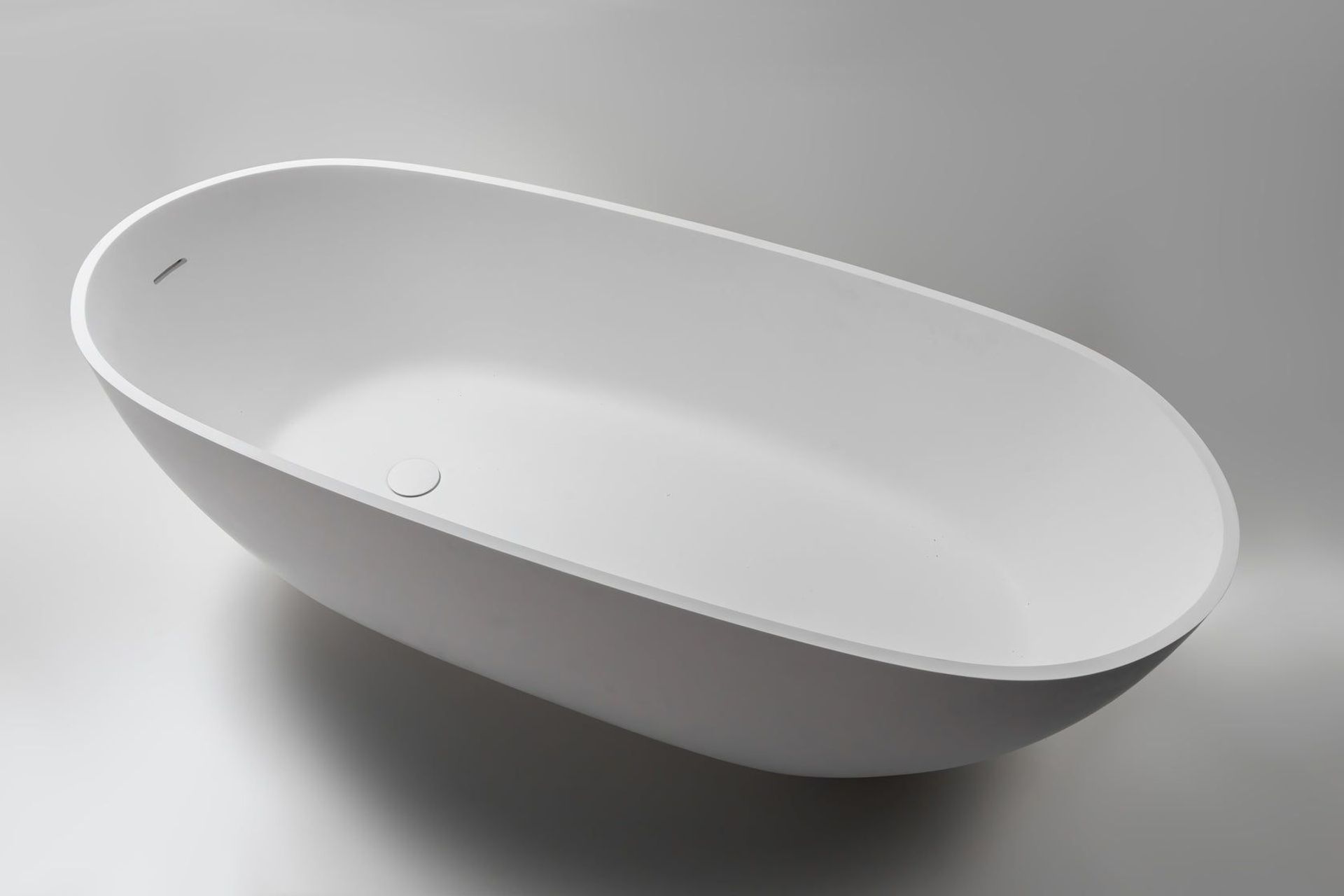 Designed for lying down in complete relaxation, the Almafi Stone Freestanding Bath has strong  Mediterranean vibes.