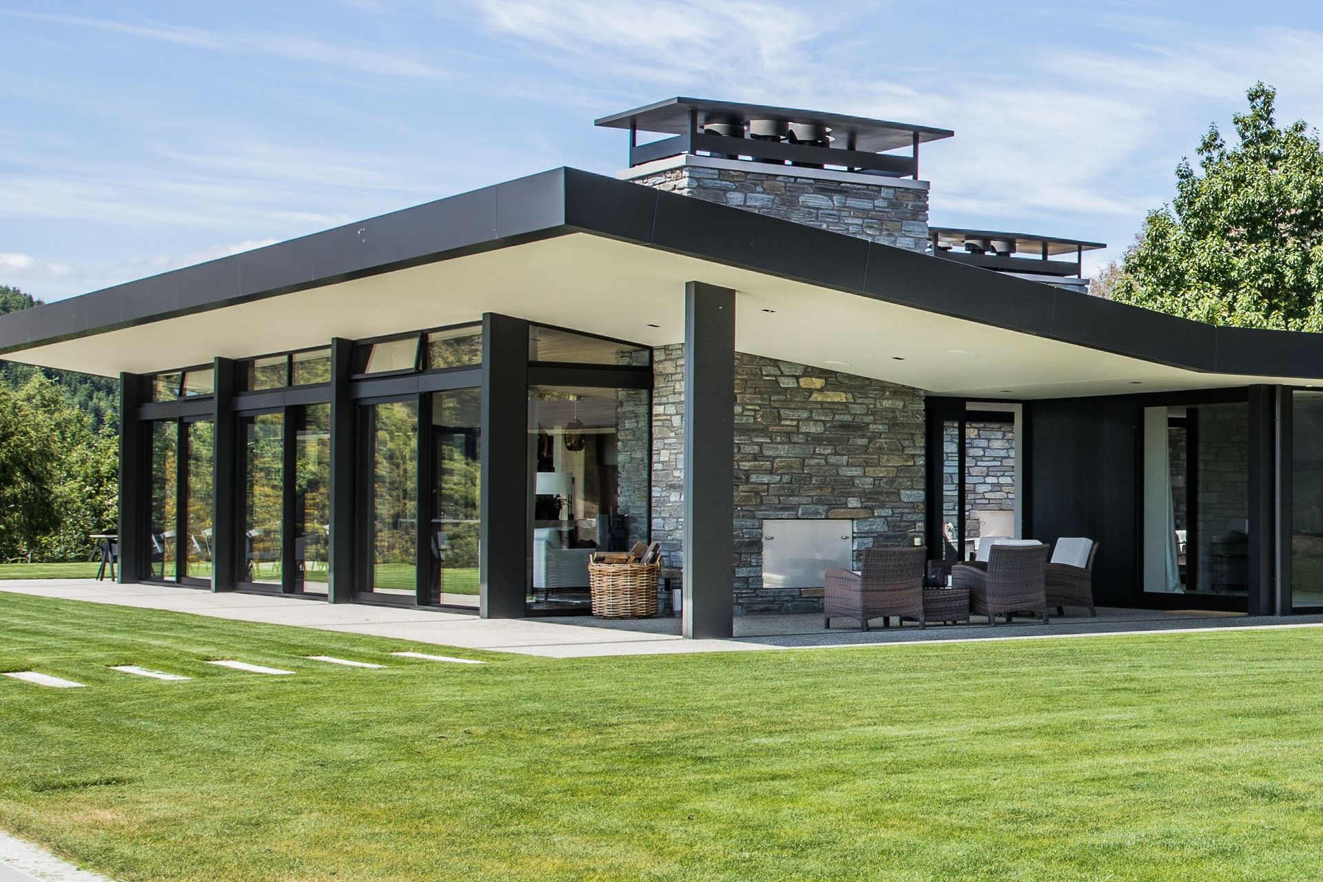 This home was clad with a blend of Wanaka Stone's Poolburn Grey and Cluden Grey stone.