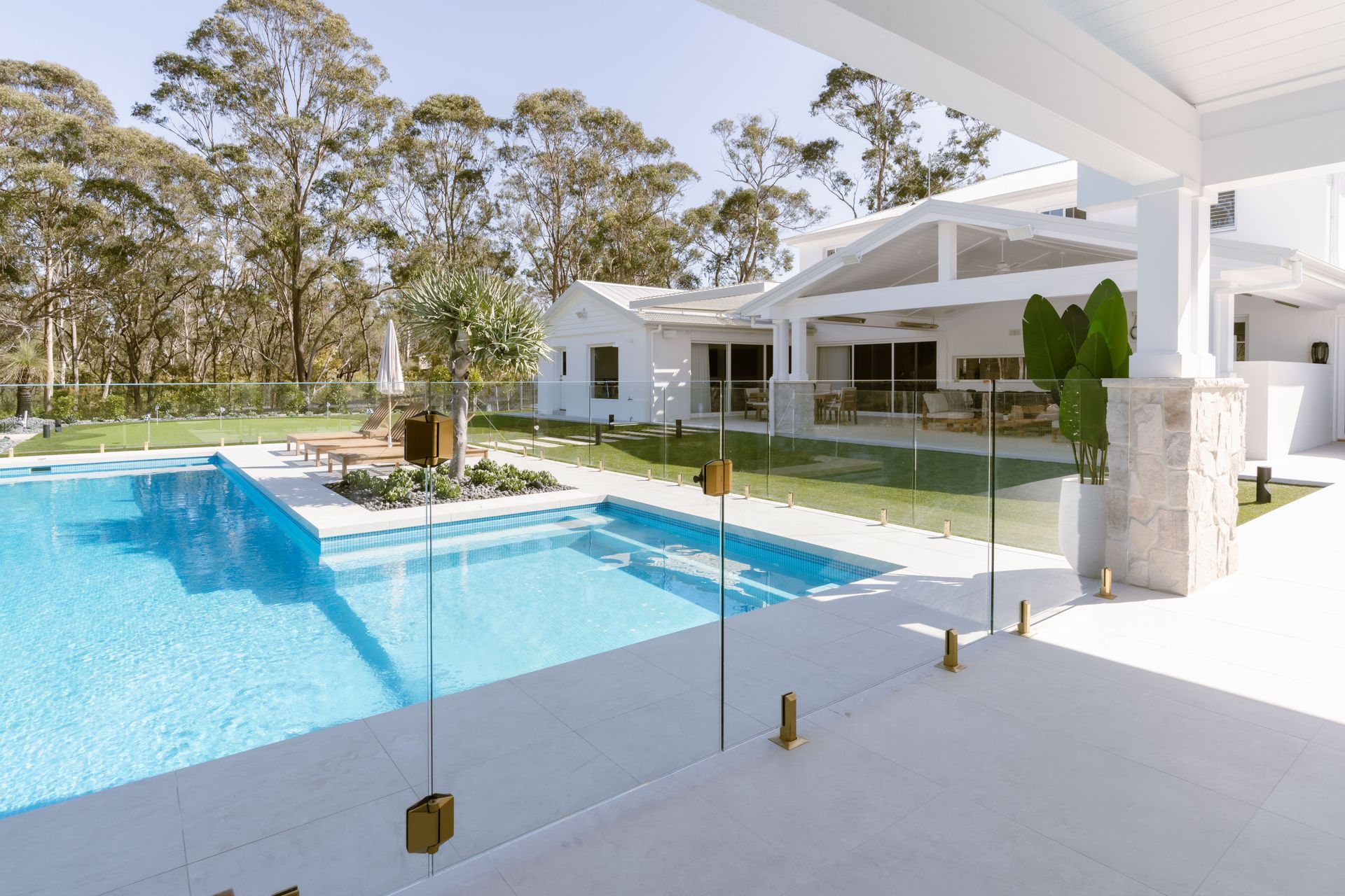 Brass hardware was chosen, further elevating the look of the pool space.