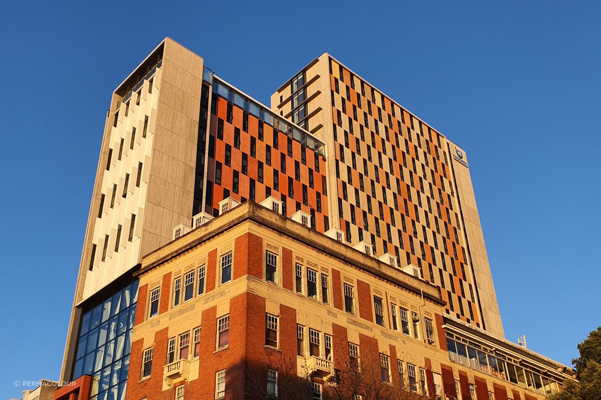 "We did a project where we created colours going into pre-cast coloured panels for a student accommodation building facade in the Auckland CBD. The architects came up with the colours they wanted, and Concretec Precast asked Permacolour to match them. The whole building was covered in these panels with a few variations in colour to create an interesting design."