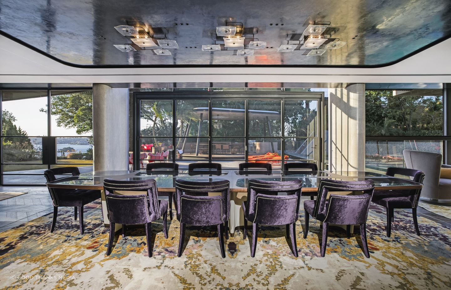 Open-plan living areas are perfectly suited for layered lighting