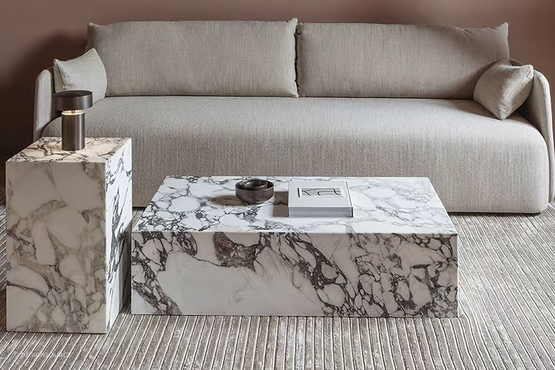 The beautiful veining of the Italian marble plinth is a real showstopper for the Calacatta Viola Side Table and its coffee table equivalent.