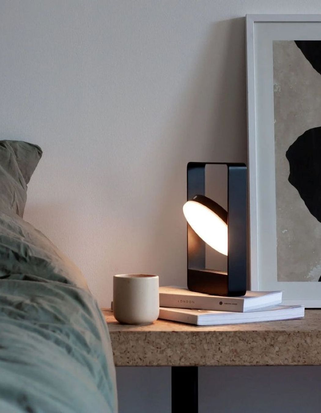 Powered by a rechargeable battery, the Case Mouro Lamp is a versatile, portable lighting solution.