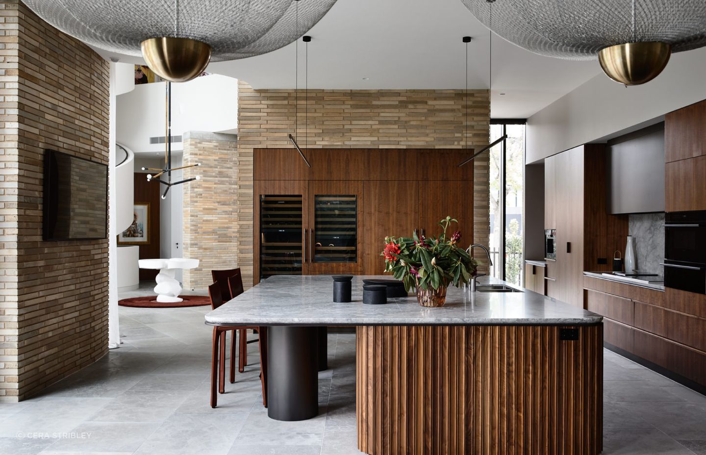 Brick is abundant throughout the interior of this lavishly furnished home