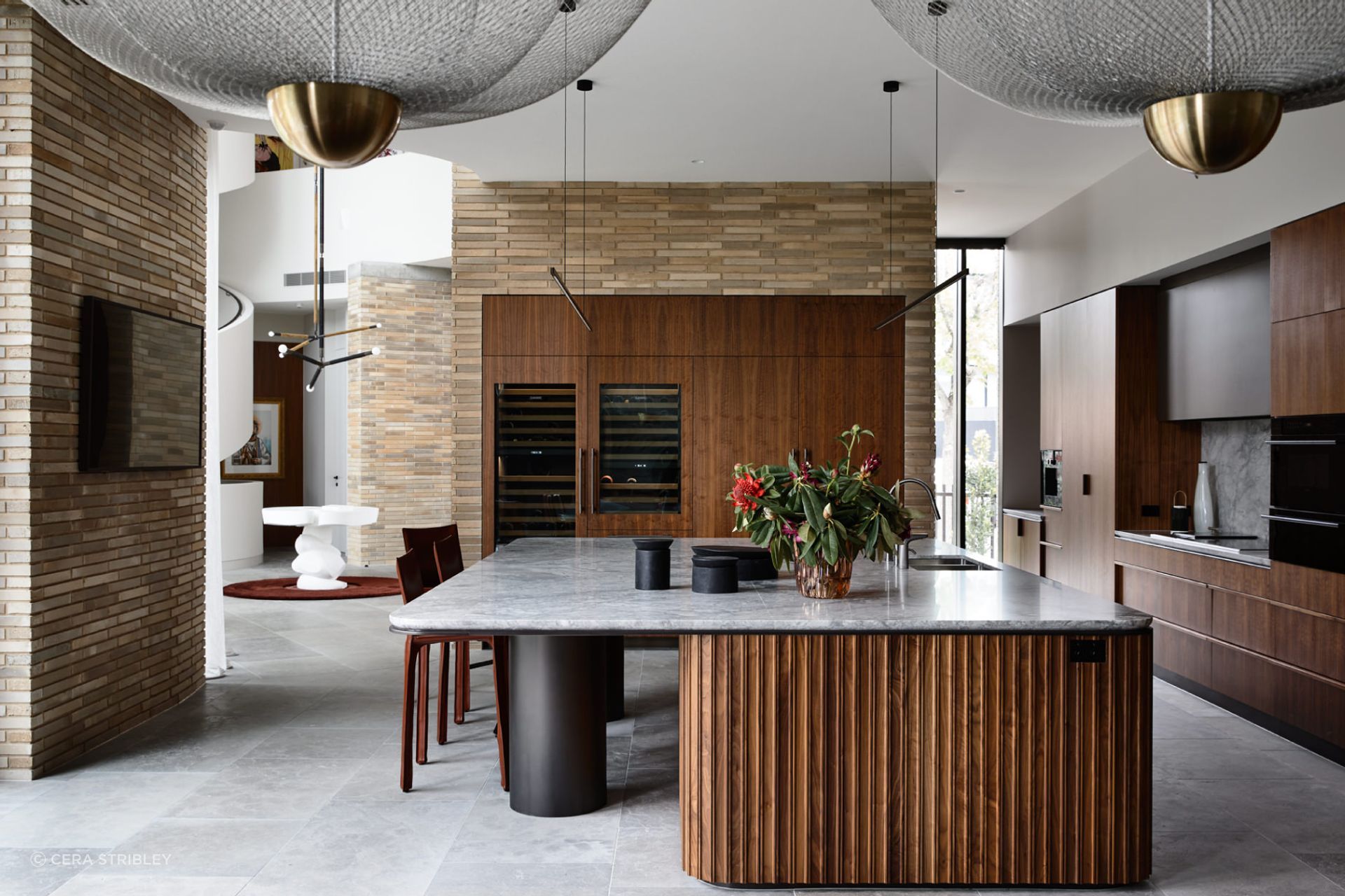 Brick is abundant throughout the interior of this lavishly furnished home