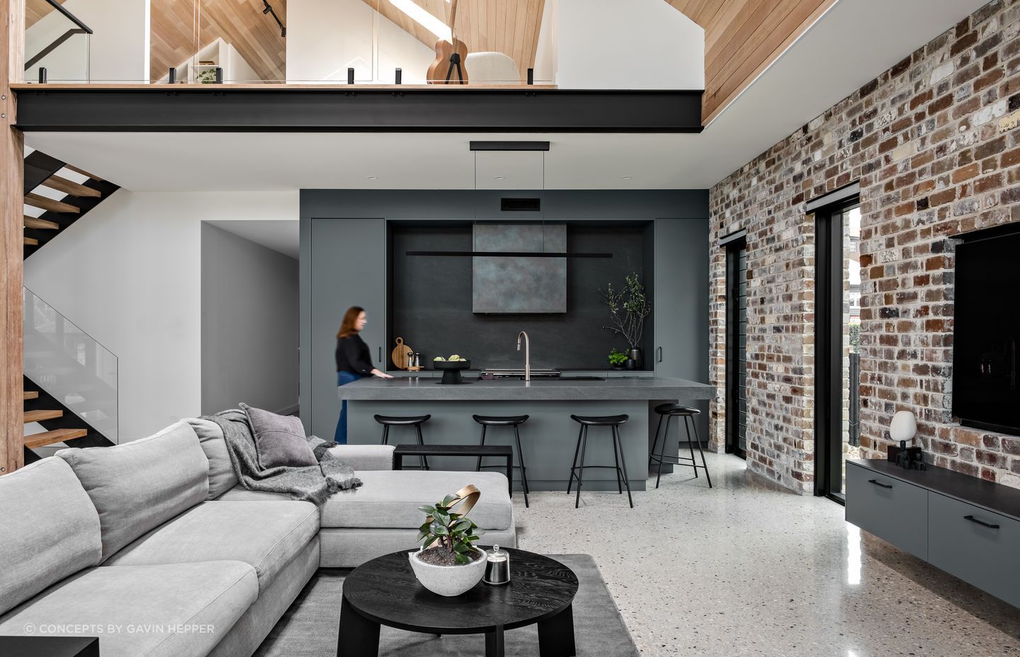 The textural bricks also play a prominent role inside the home, complemented by other superb material choices