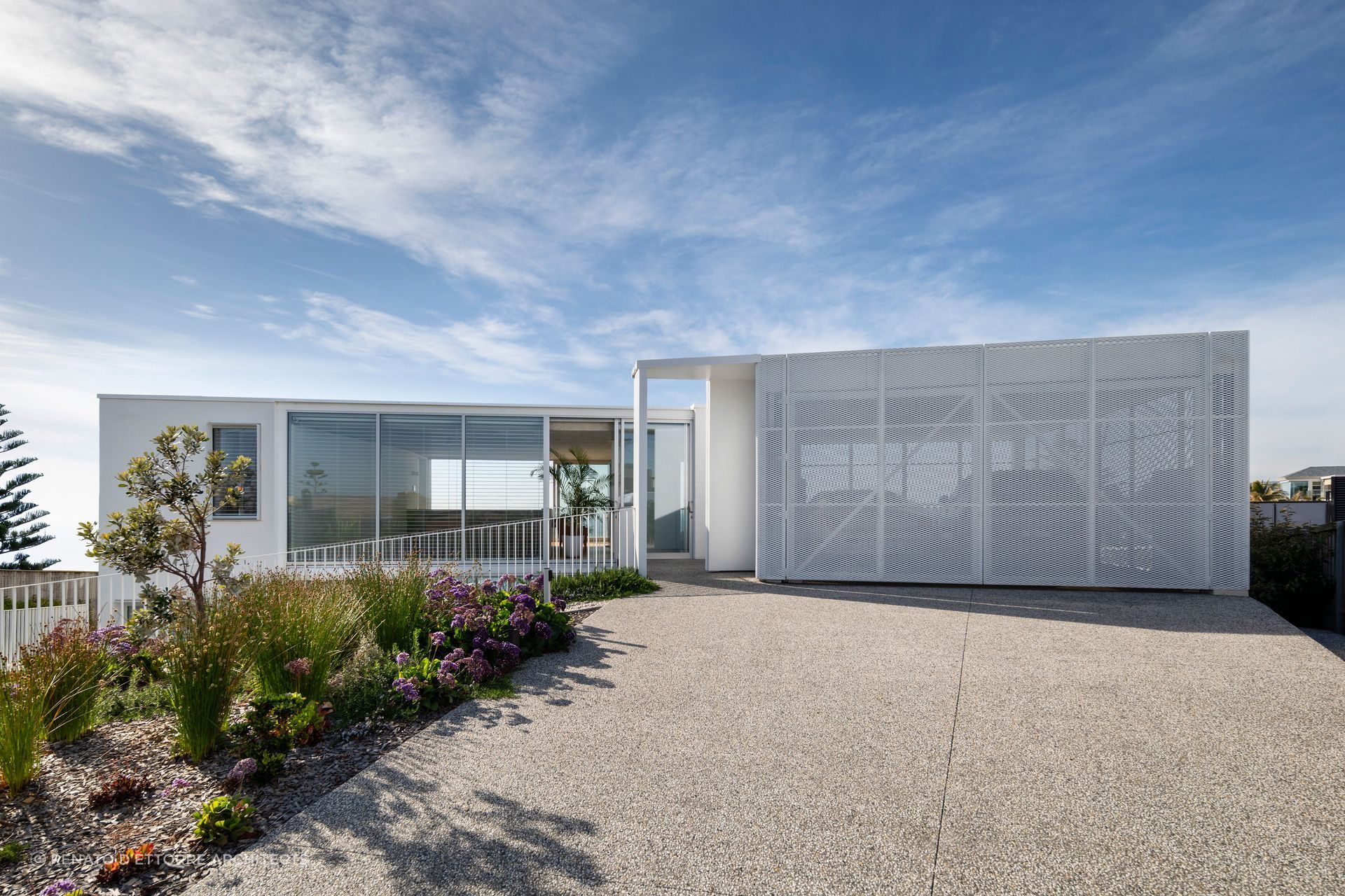Rendered white bricks are showcased at K House, nothing short of a coastal masterpiece - Photography: Dianna Snape