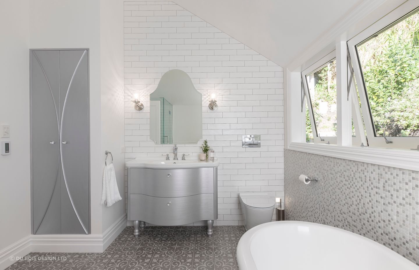 On style with every element, including the bathroom vanity lights in this bathroom renovation in Epsom