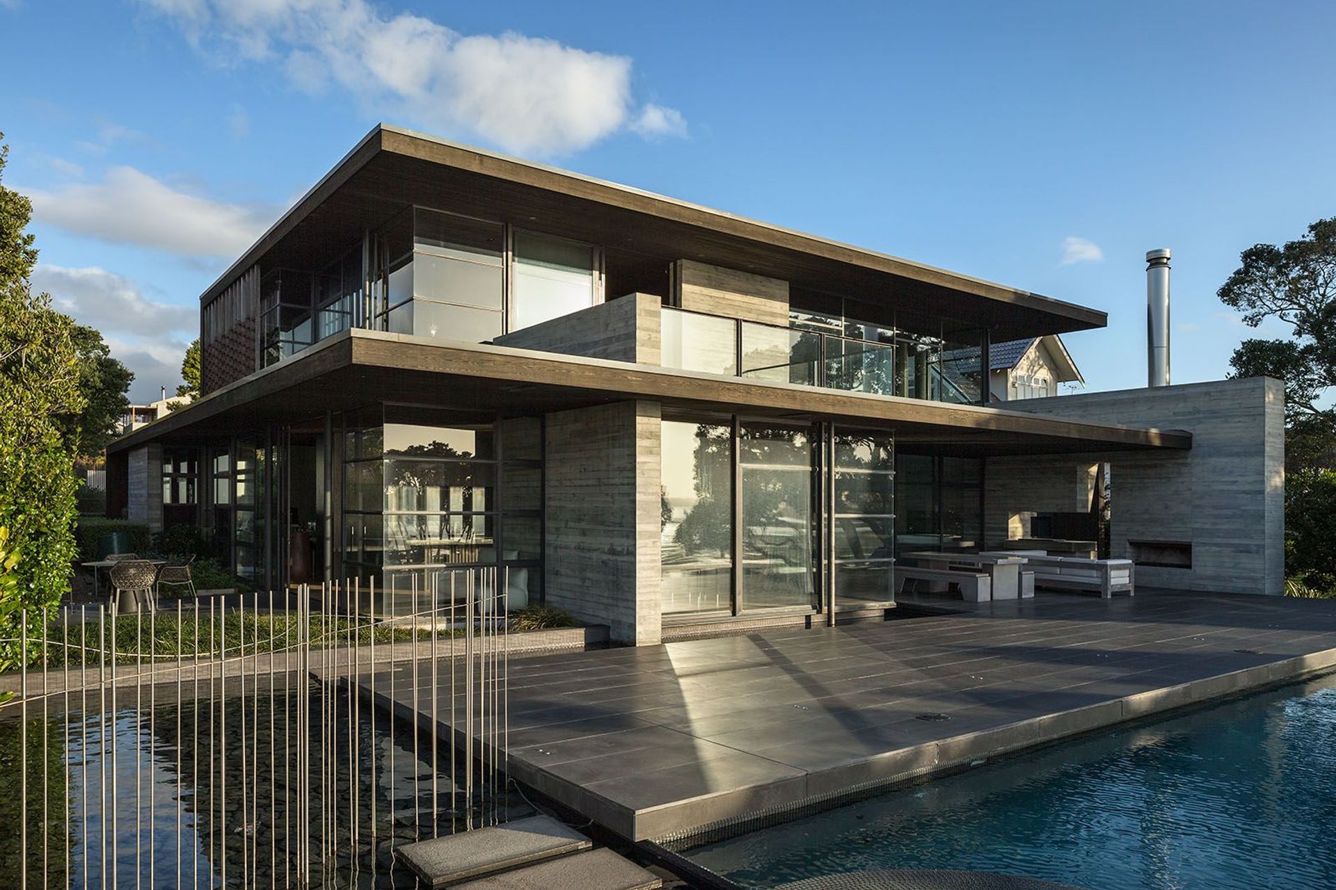 This Westmere home built by Bannan Construction features extensive in situ concrete.