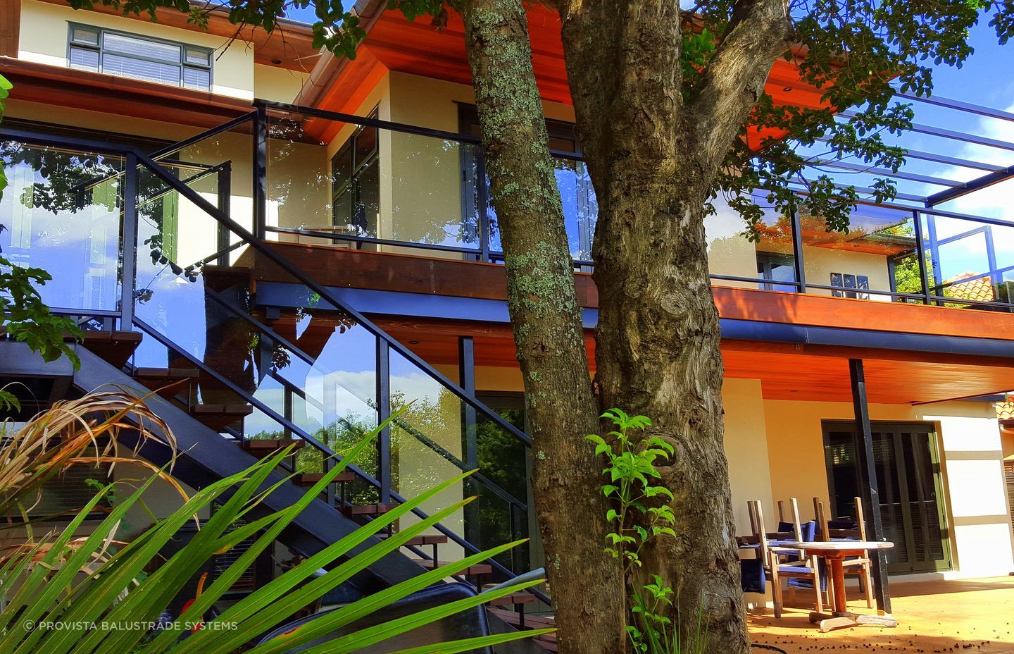 A framed glass balustrade by Provista Balustrade Systems shows how a house can be easily updated.