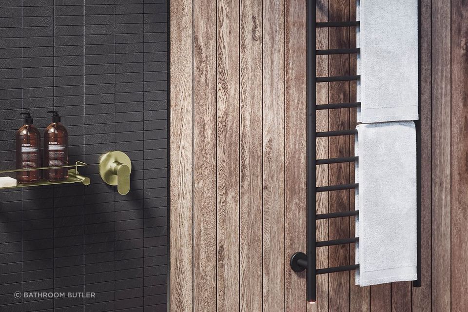 Mix and match with brushed gold and matt black bathroom accessories.