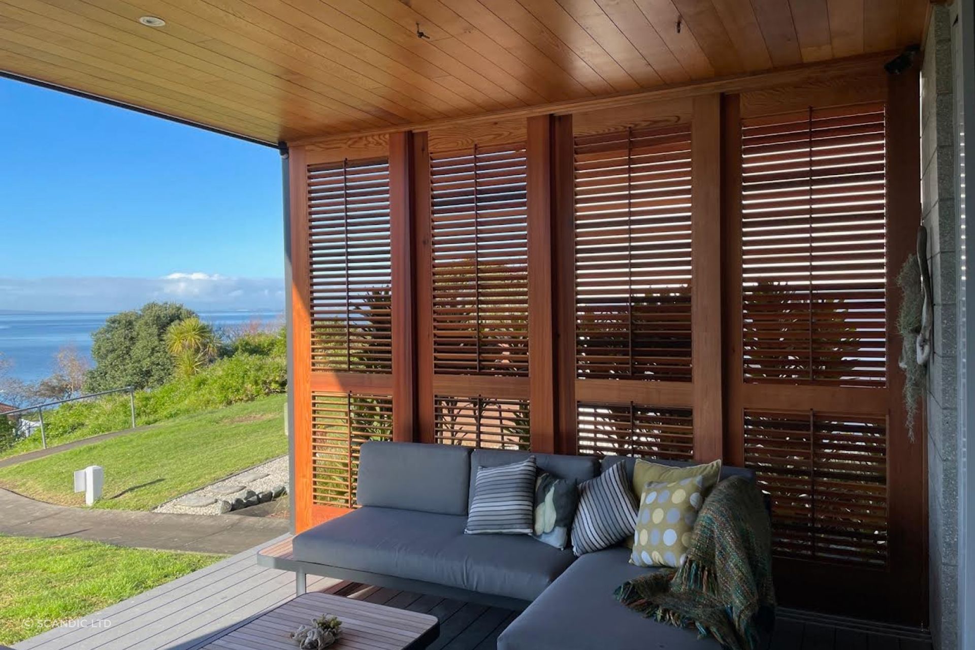 This red cedar privacy screen showcases Michael's expert craftsmanship, with adjustable louvres to control light and air flow.